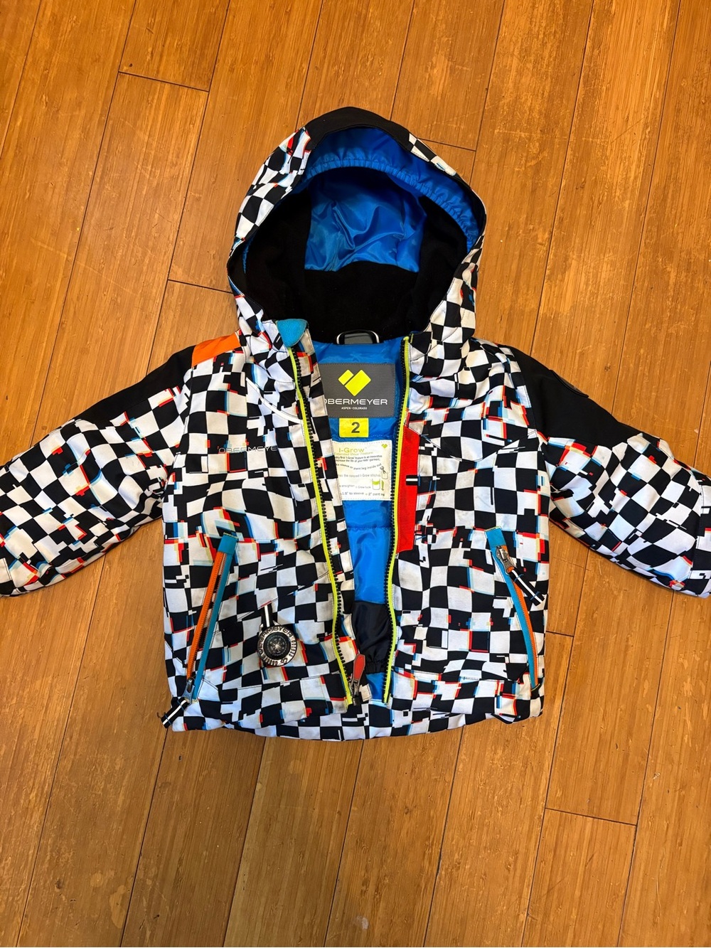 Obermeyer Toddler Grow w/ Me Checkerboard Ski Jacket with Neon Zipper & Compass